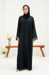 Stella Abaya | Buttoned Up