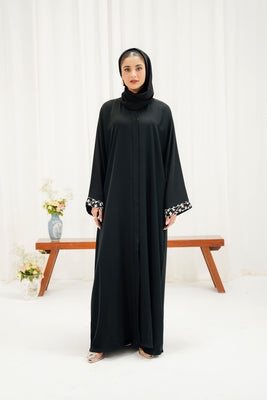 Stella Abaya | Buttoned Up